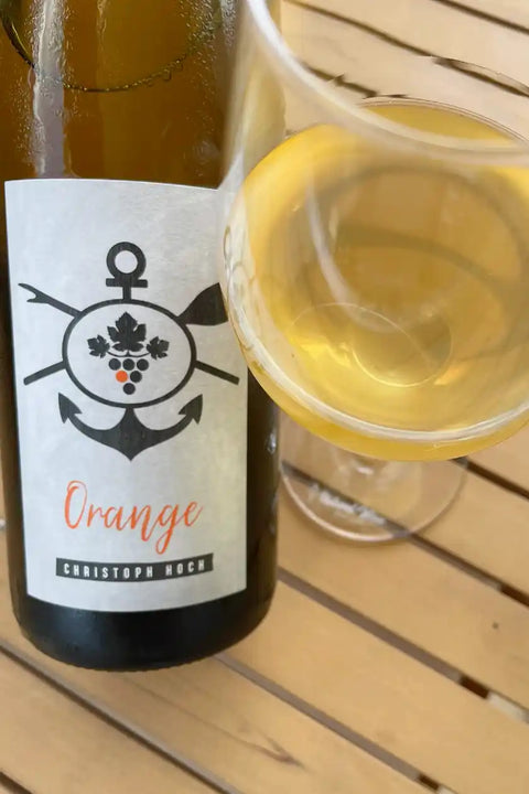 Bottle and glass of Christoph Hoch Orange 19.20.21 - Natural Wine Dealers