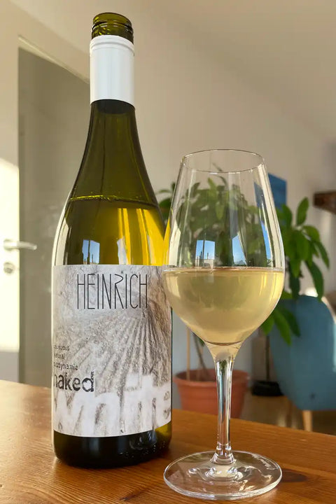 Heinrich Naked White 2023 bottle and glass - Natural Wine Dealers