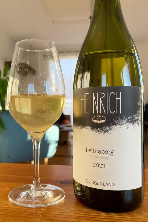 Heinrich Chardonnay Leithaberg 2023 bottle and glass - Natural Wine Dealers