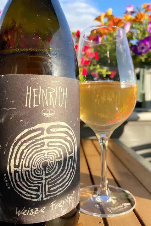 Bottle and glass of Heinrich Weisze Freyheit 2023 - Natural Wine Dealers