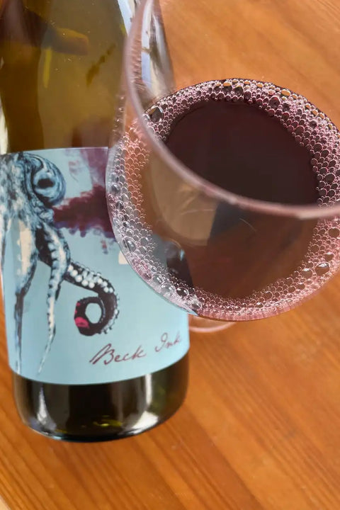 Bottle and glass of Judith Beck Beck ink - Natural Wine Dealers