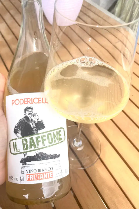 Poderi Cellario Il Baffone 2023 bottle and glass - Natural Wine Dealer