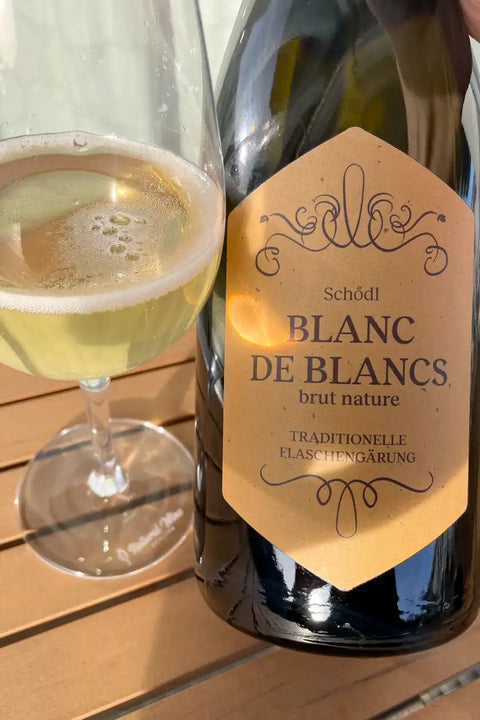Bottle and glass of Weingut Schödl Blanc de Blancs nv - Natural Wine Dealers