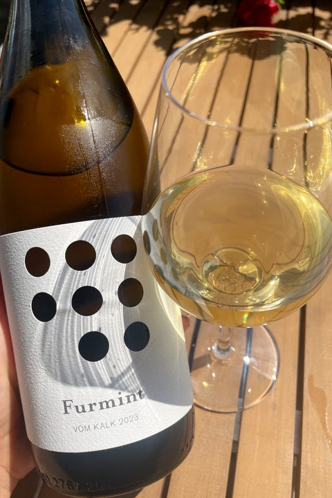Weninger Furmint vom Kalk 2023 bottle and glass - Natural Wine Dealers