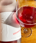 Bottle and glass of Claus Preisinger Ordinaire 2023 - Natural Wine Dealers