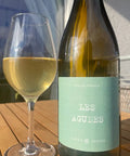 Bottle and glass of Fabien Jouves Les Agudes 2025 - Natural Wine Dealers
