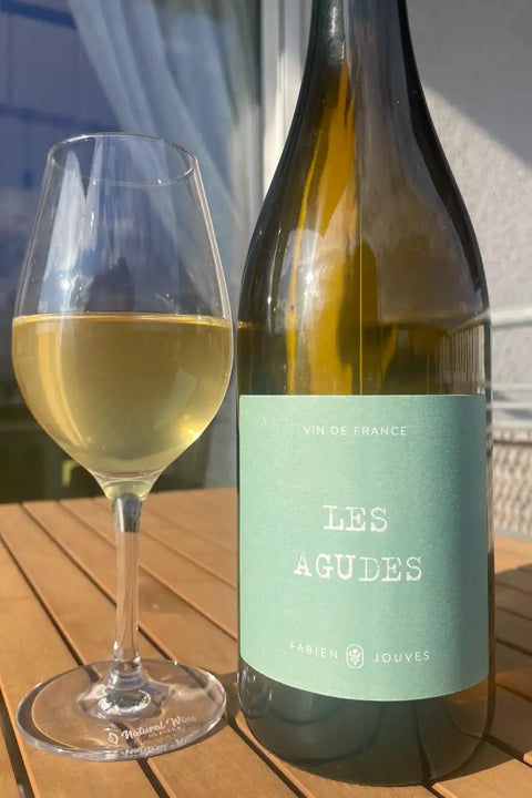 Bottle and glass of Fabien Jouves Les Agudes 2025 - Natural Wine Dealers