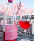 Bottle and glass of Fabien Jouves A Table 2025 - Natural Wine Dealers