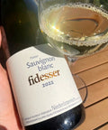 Fidesser Platter Sauvignon Blanc 2022 bottle nd glass