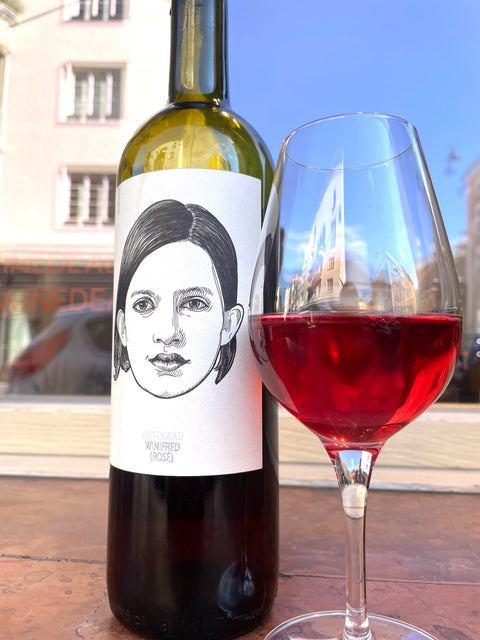 Bottle and glass of Gut Oggau Winifred 2025 - Natural Wine Dealers