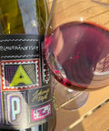 Bottle and glass of Johannes Trapl Blaufraenkisch 2023 - Natural Wine Dealers