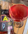 Bottle  and glass of Johannes Trapl Piece of Mind Rosé 2024 - natural Wine Dealers