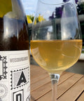 Bottle and glass of Johannes Trapl Weissburgunder 2023 - Natural Wine Dealers