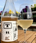 Bottle and glass of Johannes Trapl Petillant Naturel 2023 - Natural Wine Dealers