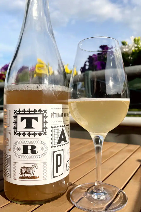 Bottle and glass of Johannes Trapl Petillant Naturel 2023 - Natural Wine Dealers