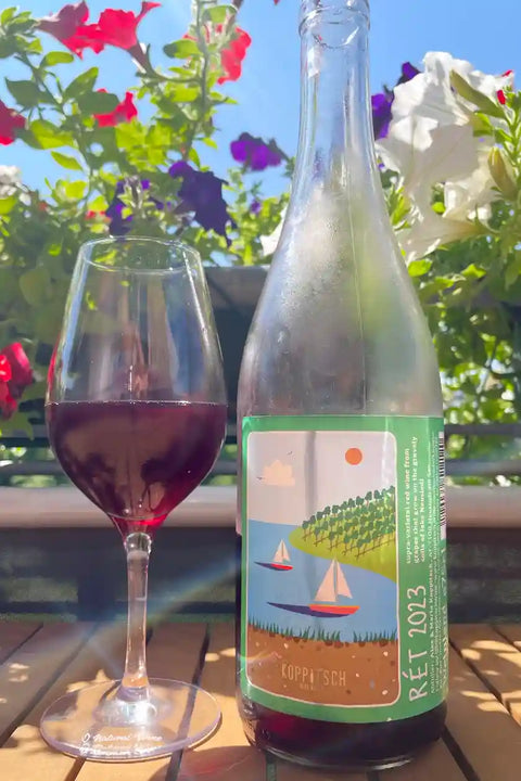 A bottle and a glass of Ret from Koppitsch 2023 - Natural Wine Dealers