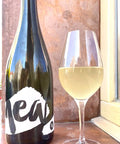 Bottle and glass of Matic Mea Pet Nat White - Natural Wine Dealers