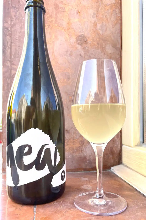 Bottle and glass of Matic Mea Pet Nat White - Natural Wine Dealers
