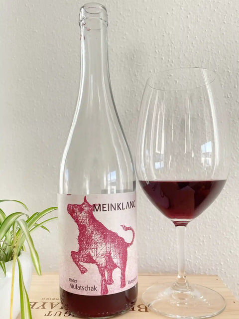 Meinklang Roter Mulatschak 2021 bottle and glass