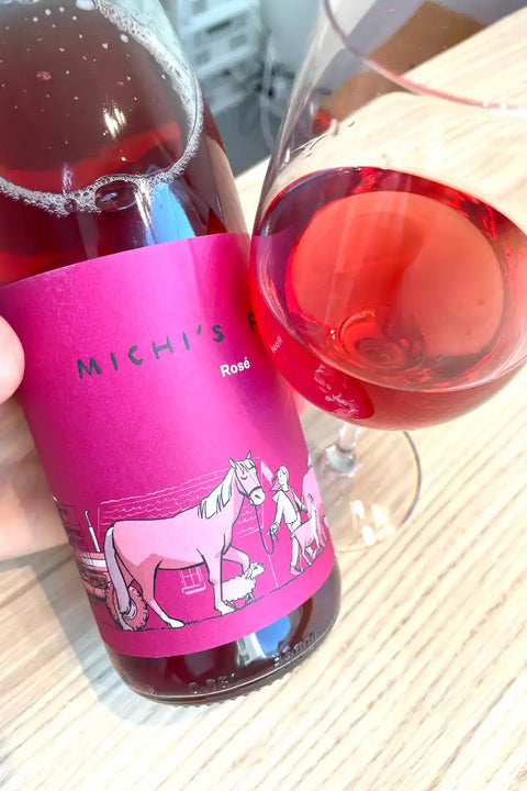 Bottle and glass of Michael Gindl Michis Farm Rosé 2025 - Natural Wine Dealers