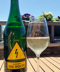 Bottle and glass of Milan Nestarec Danger 380 volts Pet Nat 2025 - Natural Wine Dealers