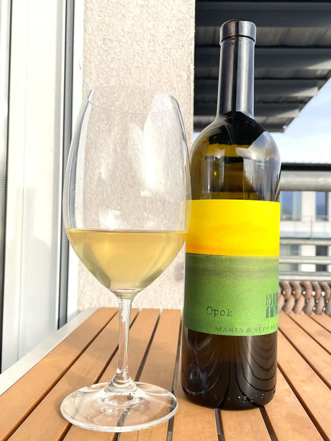 Muster Opok 2021 bottle with glass