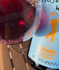 Bottle and glass of Projekt Wildtyp Heppi Peppi 2023 - Natural Wine Dealers