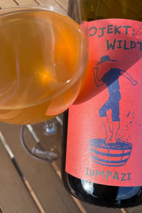 Bottle and glass of Projekt Wildtyp Lumpazi 2024 - Natural Wine Dealers