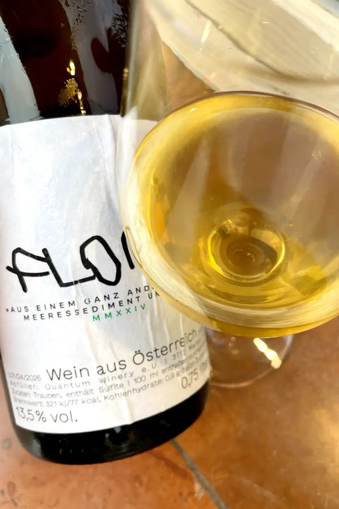 Bottle and glass of Quantum Winery Floris - Natural Wine Dealers