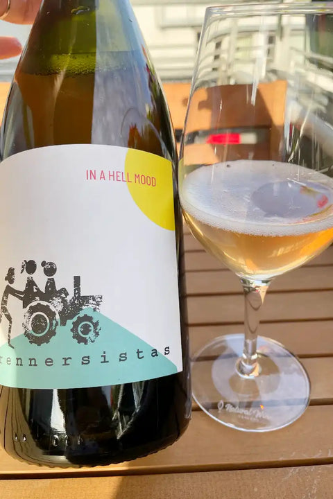 Bottle and glass of Rennersistas In a Hell Mood 2022 - Natural Wine Dealers