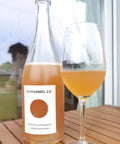 Schrammel Color Orange bottle and glass