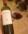 Tenute Dettori Renosu Rosso 2021 bottle and glass