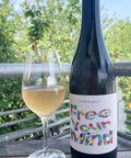 Bottle and glass of Weingut Schoedl Free your Mind 2024 - Natural Wine Dealers